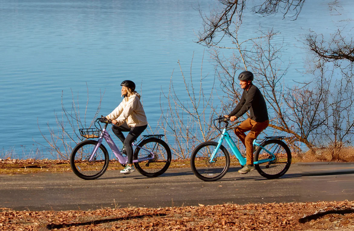 Two people riding bicycles 